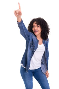 A beautiful african woman pointing to something, isolated over a white background