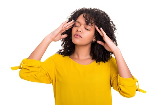 A worried young african woman, isolated over white