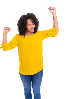 Studio shot of a Very Happy african woman with arms raised