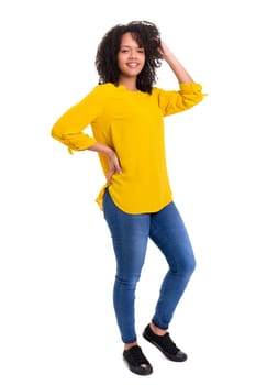 Beautiful young african woman posing isolated over white