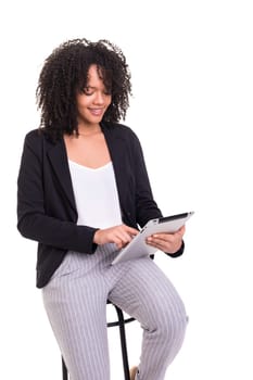 Young african business woman working with a laptop pc, isolated over white