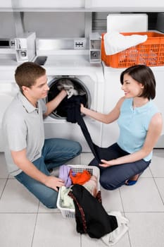 Couple in a laundromat