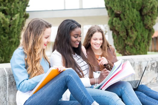 Group multi ethnic young students at the university campus