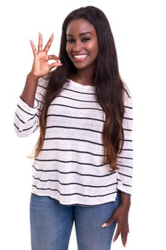Beautiful young woman signaling ok, isolated over white
