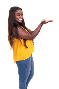 Beautiful african business woman presenting your product, isolated over white