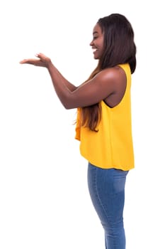 Beautiful african business woman presenting your product, isolated over white