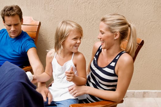 Girl having fun with her parents