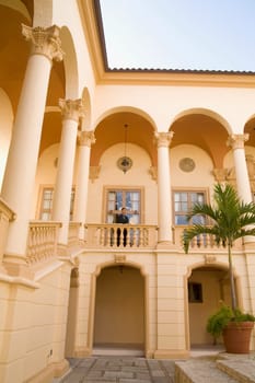 Businessman standing in the balcony, Biltmore Hotel, Coral Gables, Florida, USA