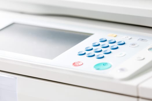 Detail of a modern digital printer of a copy center