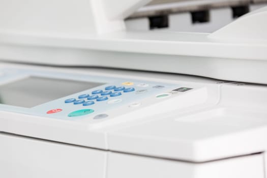 Detail of a modern digital printer of a copy center