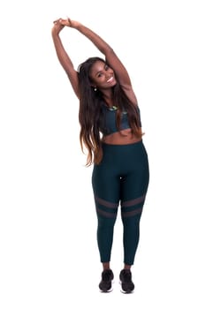 Beautiful large african woman doing exercise - Isolated over white