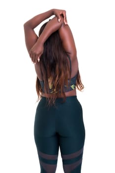 Beautiful large african woman doing exercise - Isolated over white