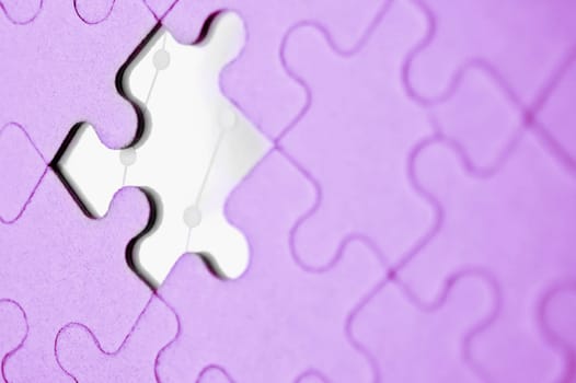 Completed jigsaw puzzle with a white piece