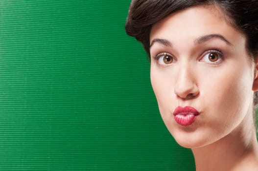 Close_up of a woman puckering her lips