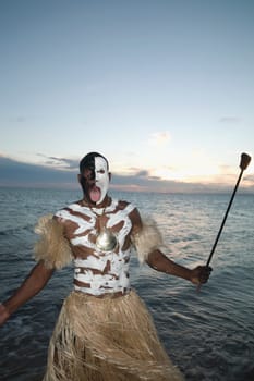 Tribesman looking angry on the beach