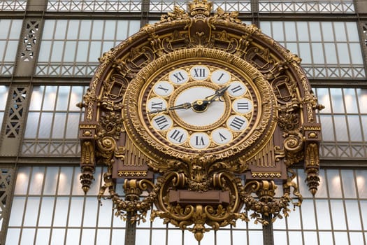 Paris, France - October 7, 2018: Golden clock of the museum D'Orsay.The Musee d'Orsay is a museum in Paris, on the left bank of the Seine.