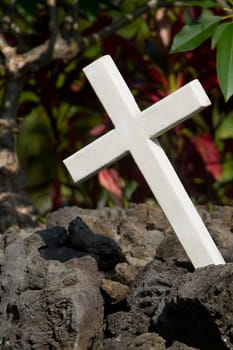 Close_up of a cross on a grave