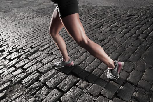 Woman jogging in a street