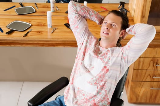 Man sitting in a salon
