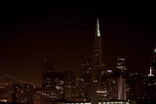 Buildings lit up at night, San Francisco, California, USA