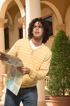 Man holding a map, Biltmore Hotel, Coral Gables, Florida, USA