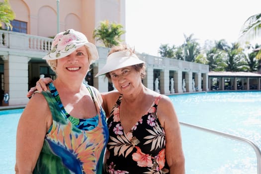 Portrait of two women at the poolside, Biltmore Hotel, Coral Gables, Florida, USA