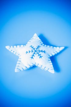 Close_up of a star shaped cushion