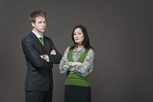 Portrait of a businessman and a businesswoman standing together