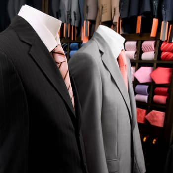 Mannequins dressed in formalwear in a clothing store