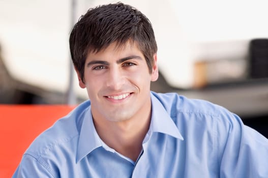 Man smiling in a restaurant