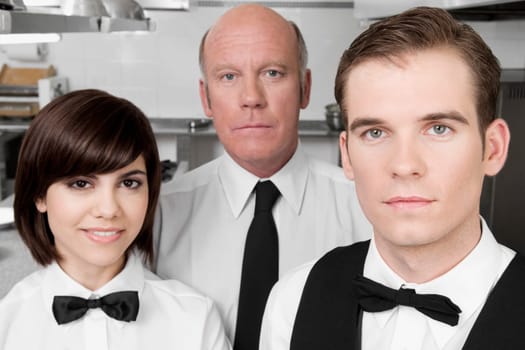 Waiters standing in the kitchen