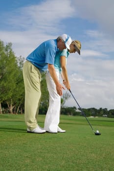 Golf instructor teaching golf to a woman, Biltmore Golf Course, Coral Gables, Florida, USA