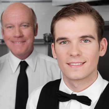 Waiters standing in the kitchen