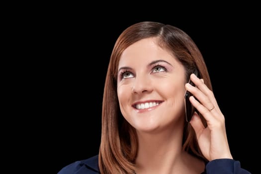 Woman talking on a mobile phone and smiling