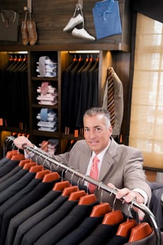 Portrait of a businessman in a clothing store