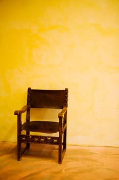 Armchair against a wall