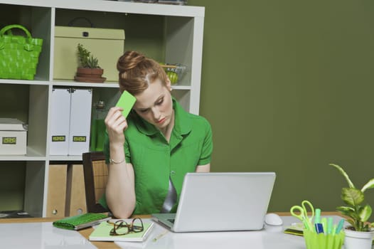 Businesswoman working on a laptop in the office