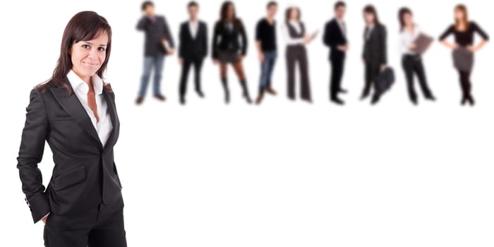 Business woman posing, with people in background
