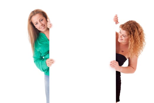 Beautiful young women holding a blank white board