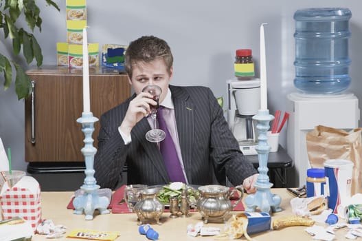 Businessman having lunch in the office