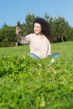 A beautiful young woman relaxing at the city park