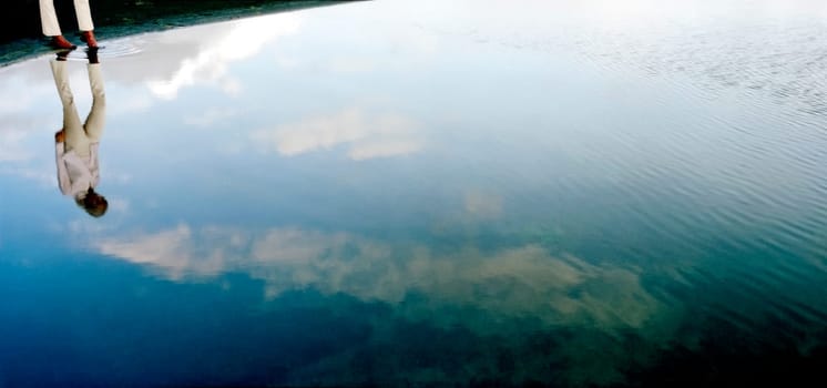 Reflection of a man in water, Iceland