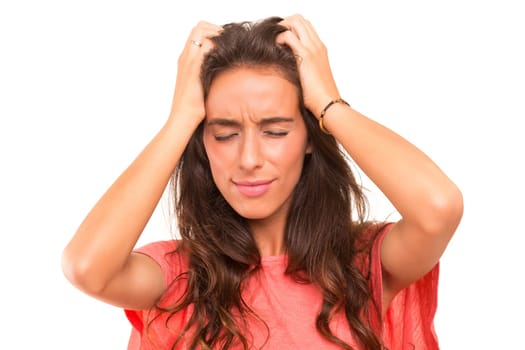 Young student tired of studying for the final exams, isolated over a white background