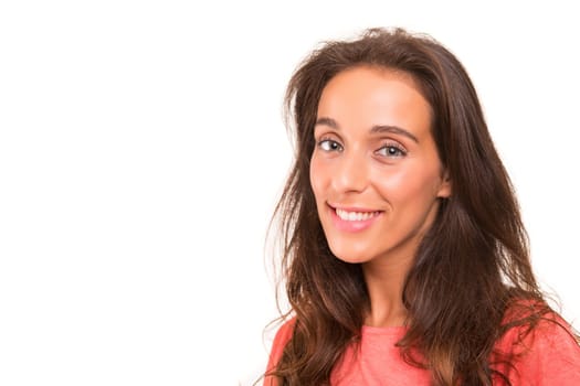 Beautiful young woman posing isolated over white background