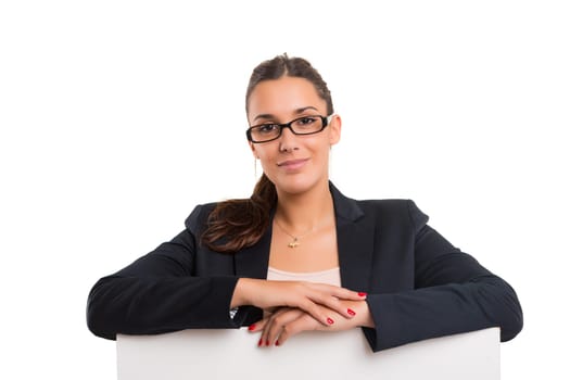 Young business woman presenting your product over a white card