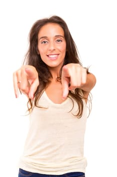 Young beautiful woman pointing at you, isolated over white