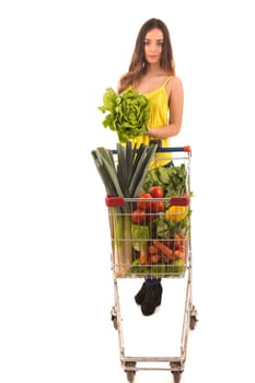 Beautiful young woman shopping at the supermarket