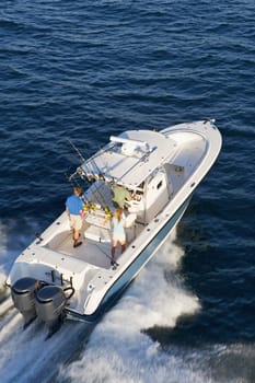 High angle view of tourists on a speedboat