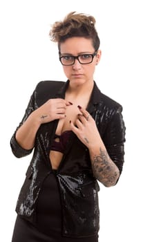 Studio shot of a young tattooed woman