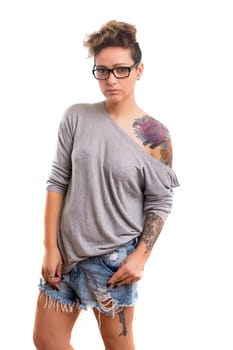 Studio shot of a young tattooed woman